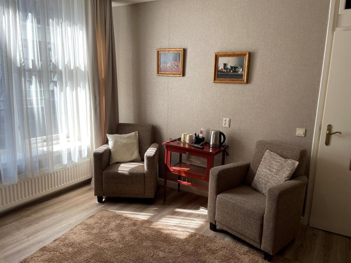 Hotel Restaurant Stad Munster فينترزفايك المظهر الخارجي الصورة A room in the hotel