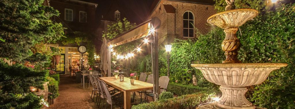 Hotel Restaurant Stad Munster فينترزفايك المظهر الخارجي الصورة The garden at night