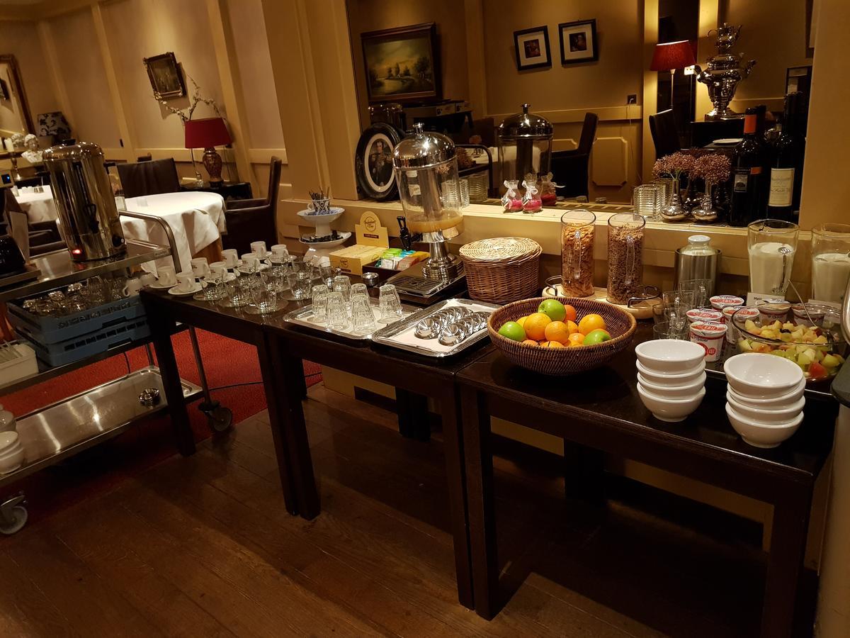 Hotel Restaurant Stad Munster فينترزفايك المظهر الخارجي الصورة A buffet at a hotel