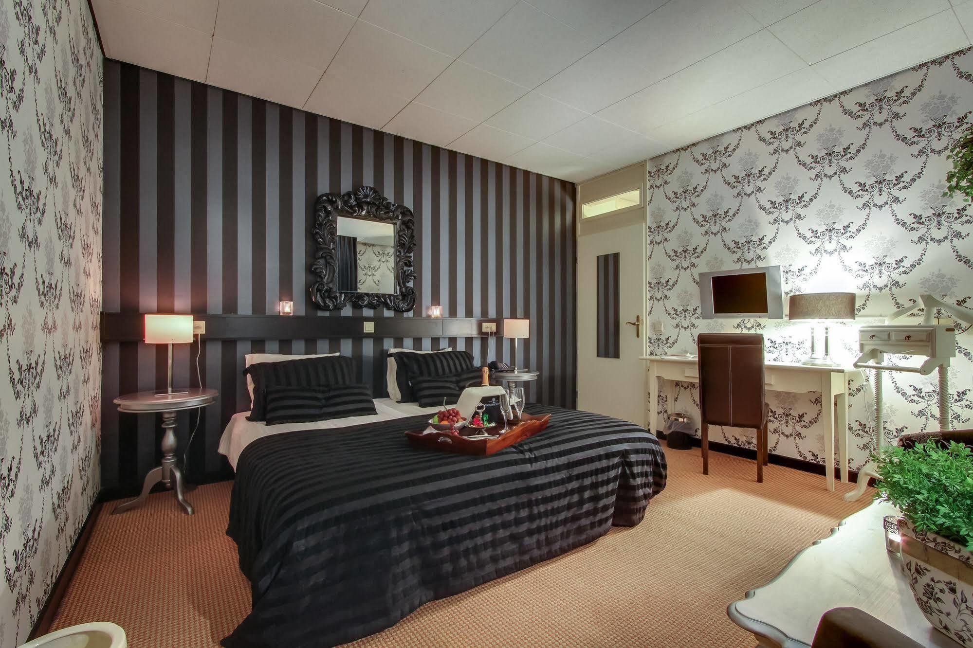Hotel Restaurant Stad Munster فينترزفايك المظهر الخارجي الصورة A room at the hotel